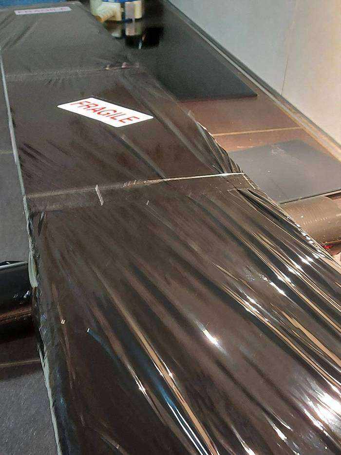 Boîte solide pour le transport de la toise en bois, pour une protection optimale pendant le transport et vos déménagements.